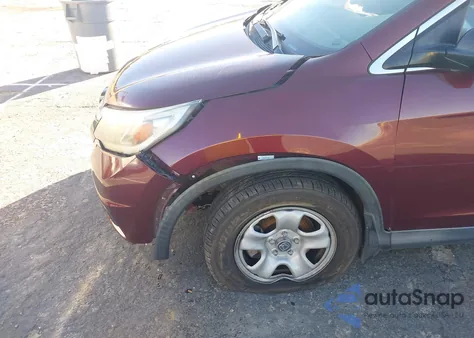 2015 Honda Cr-V Lx z USA, uszkodzony, nr VIN 2HKRM3H31FH514866